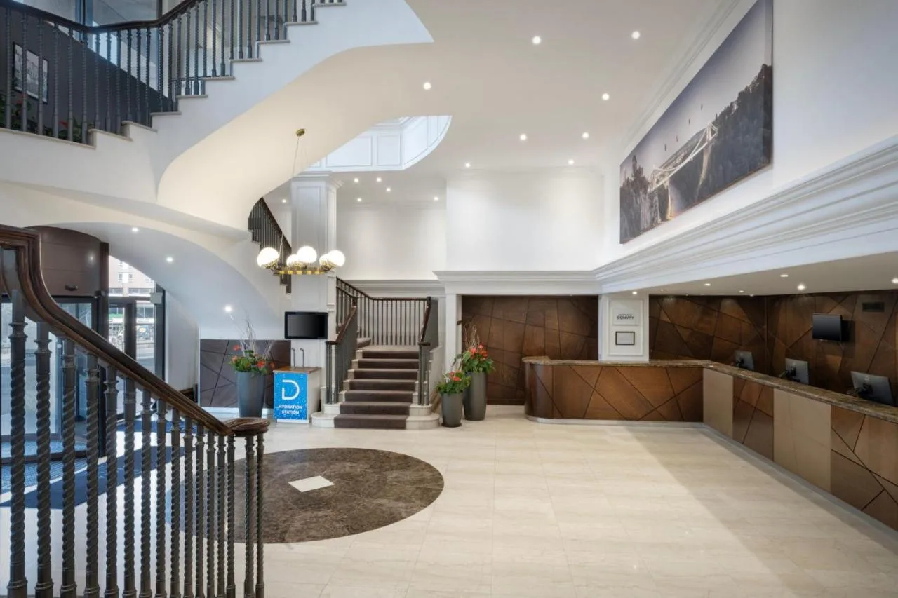 a lobby of a building with a staircase at Delta Hotels by Marriott Bristol City Centre in Bristol
